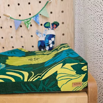 Överdrag till skötbord