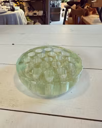 Blomsterfakir i ljusgrönt glas