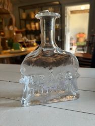 Glasflaska ”fråga först” Bertil Vallien