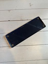 Skylt telefon
