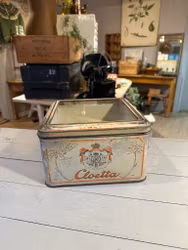 Plåtburk med glas i locket