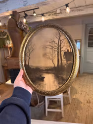 Motiv i guldfärgad ram sjö