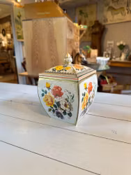 Plåtburk med knopp