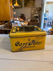 Plåtburk med glas i locket Carl Peter Påhlsson