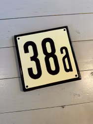 Emaljerad skylt ”38a”
