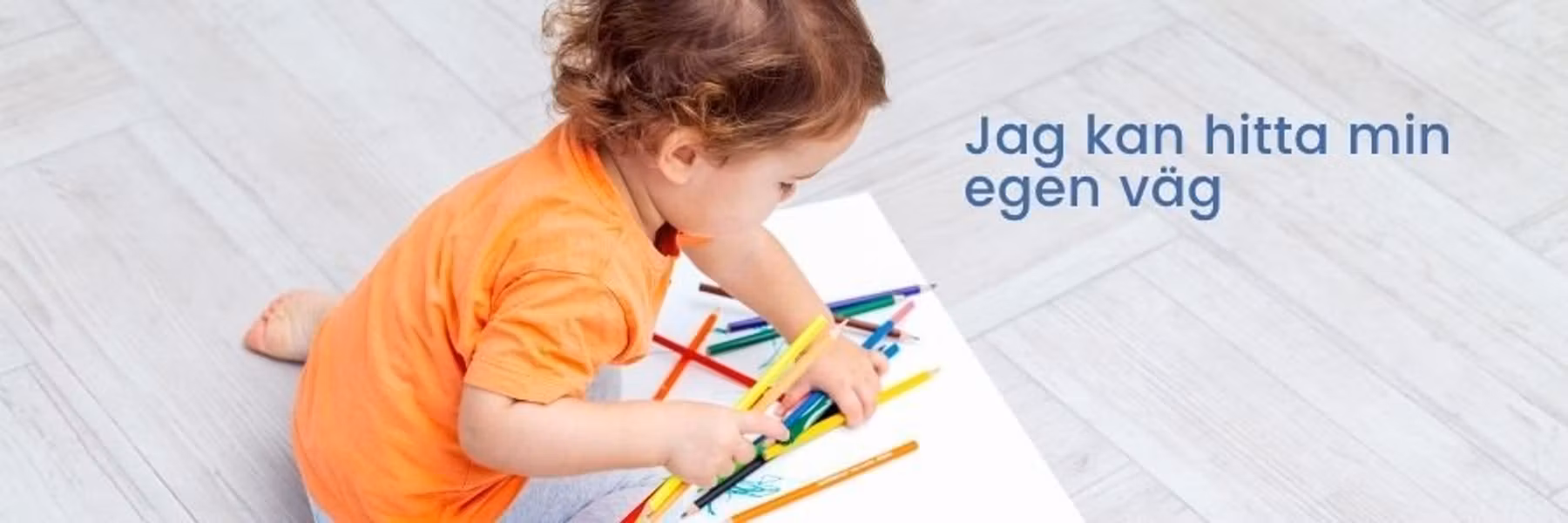 Barn ritar med färgpennor. Bildtext: Jag kan hitta min egen väg.