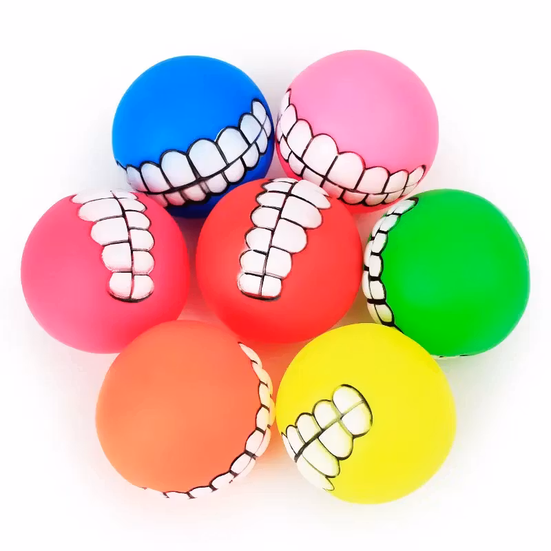 Pipande hundleksak boll av gummi som är bra och rolig.