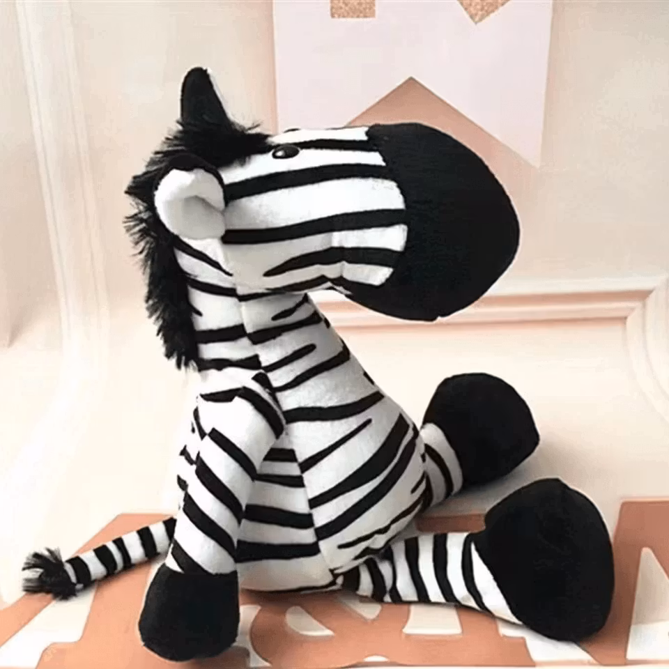 Ett gosedjur en zebra.