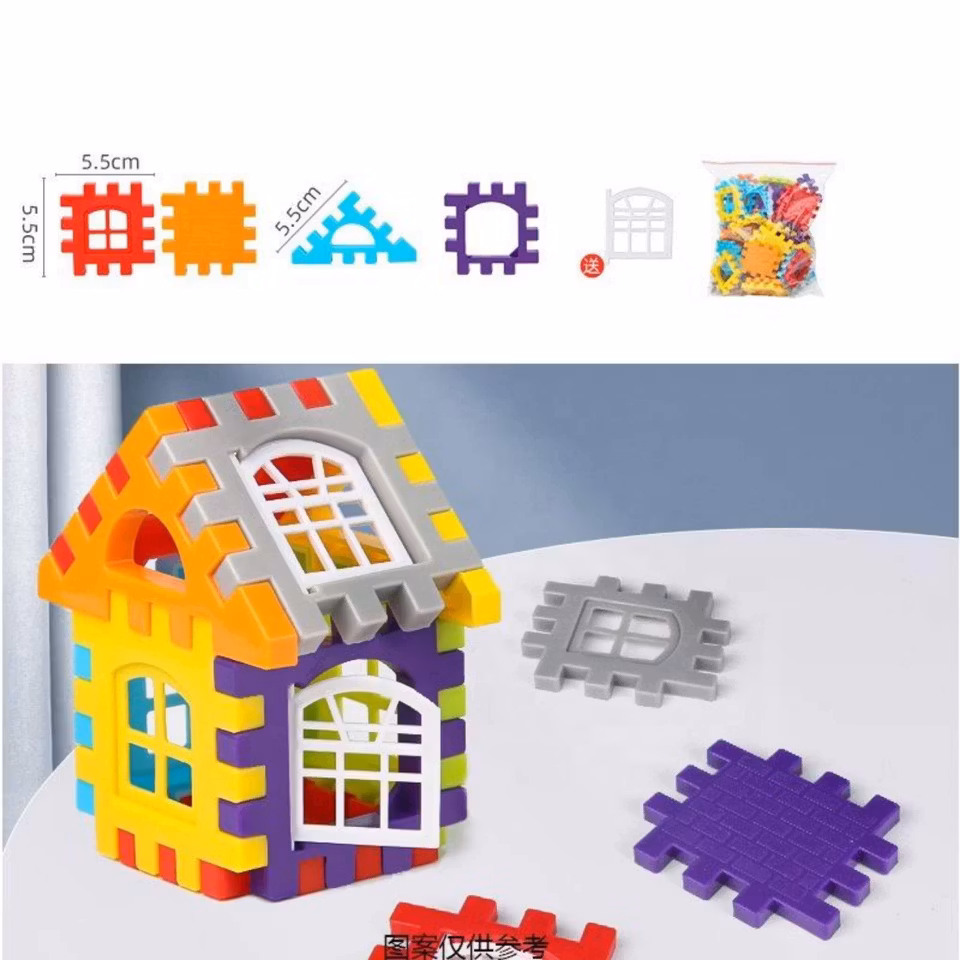 Närbild på byggklossar med fönster och tak