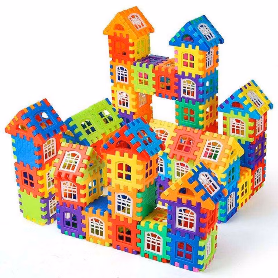Barn bygger hus med byggklossar 210 delar