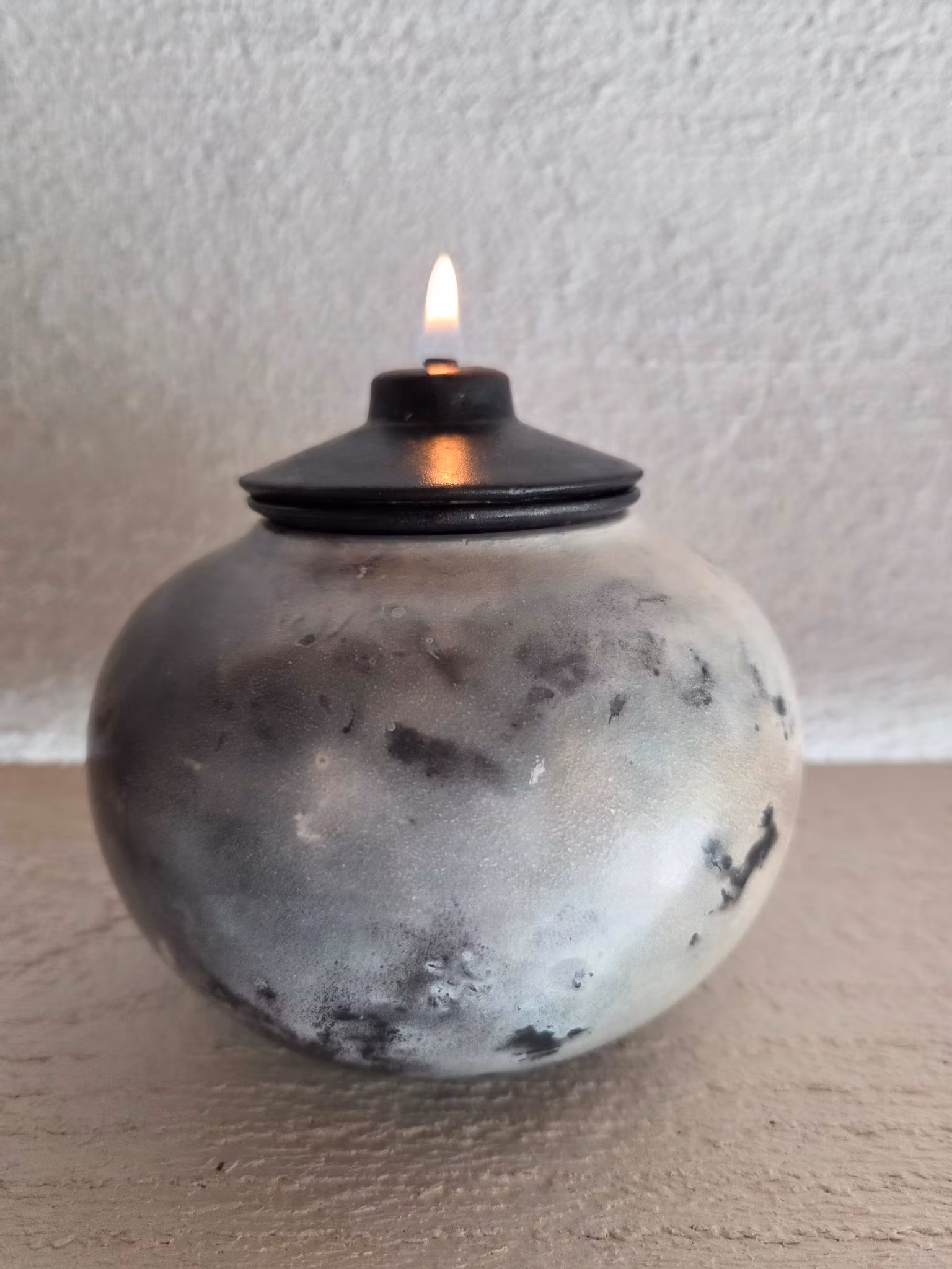 Sågspånsbränd oljelampa