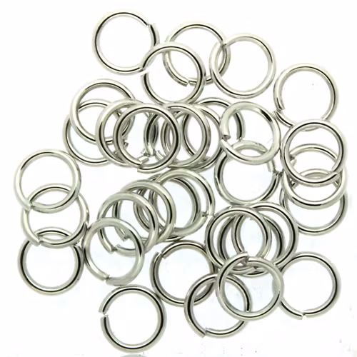 Mörkt Silverfärgade Bindringar 5x0,7mm ca. 30st