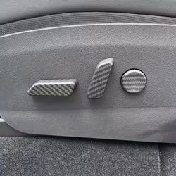 Istuinten painikkeiden paneelit mattahiilikuitua - Tesla Model 3/Y