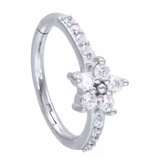 Vacker ring med vita stenar och en blomma 1,2x12 mm