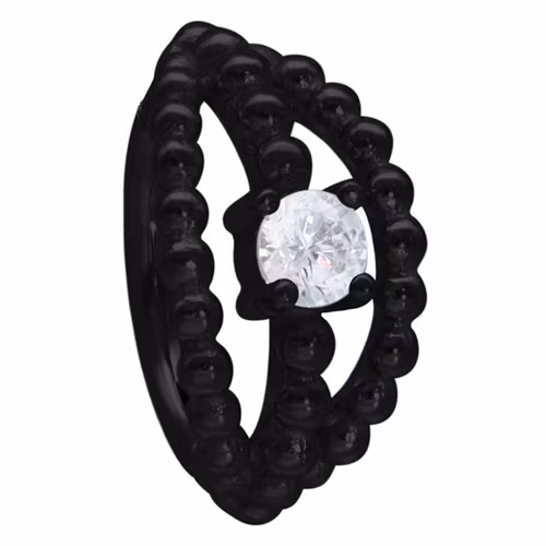 Clickkering i svart med trippeldesign och en vit sten i mitten, olika storlek