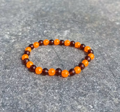Orange brun armband med akrylpärla