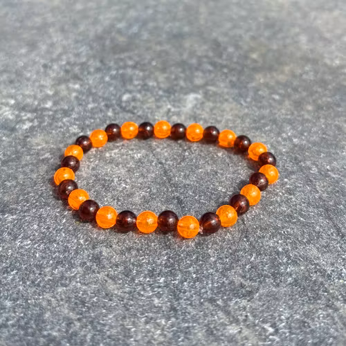 Orange brun armband med akrylpärla