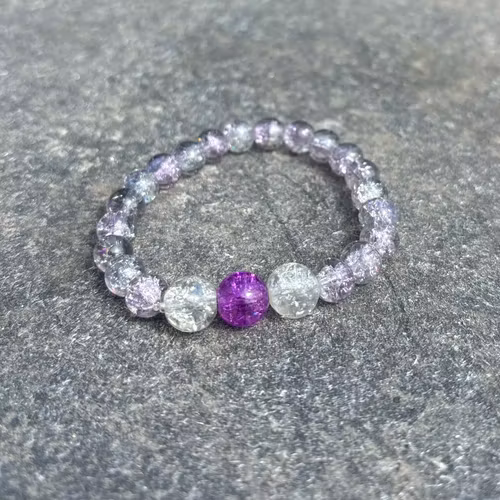 Lila/klar armband med krackelerade glaspärlor