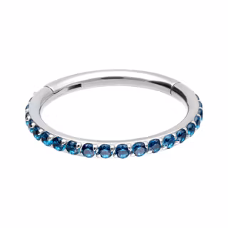 Clickerring med blå stenar Titan 1,2x8 mm