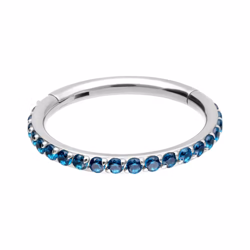 Clickerring med blå stenar Titan 1,2x8 mm