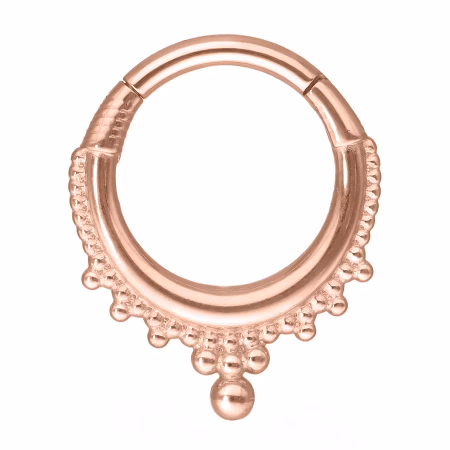 Clickerring i rose med runda detaljer 1,2x8 mm