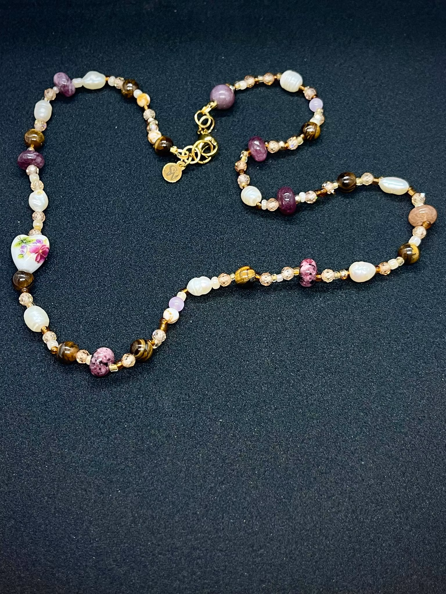 Perlekjede og lenke med evil eye