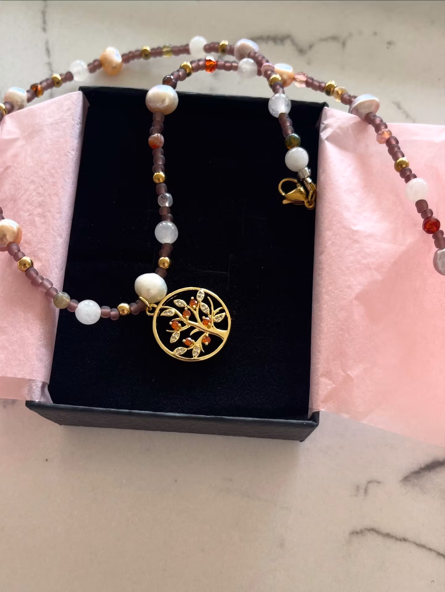 Perlekjede med anheng