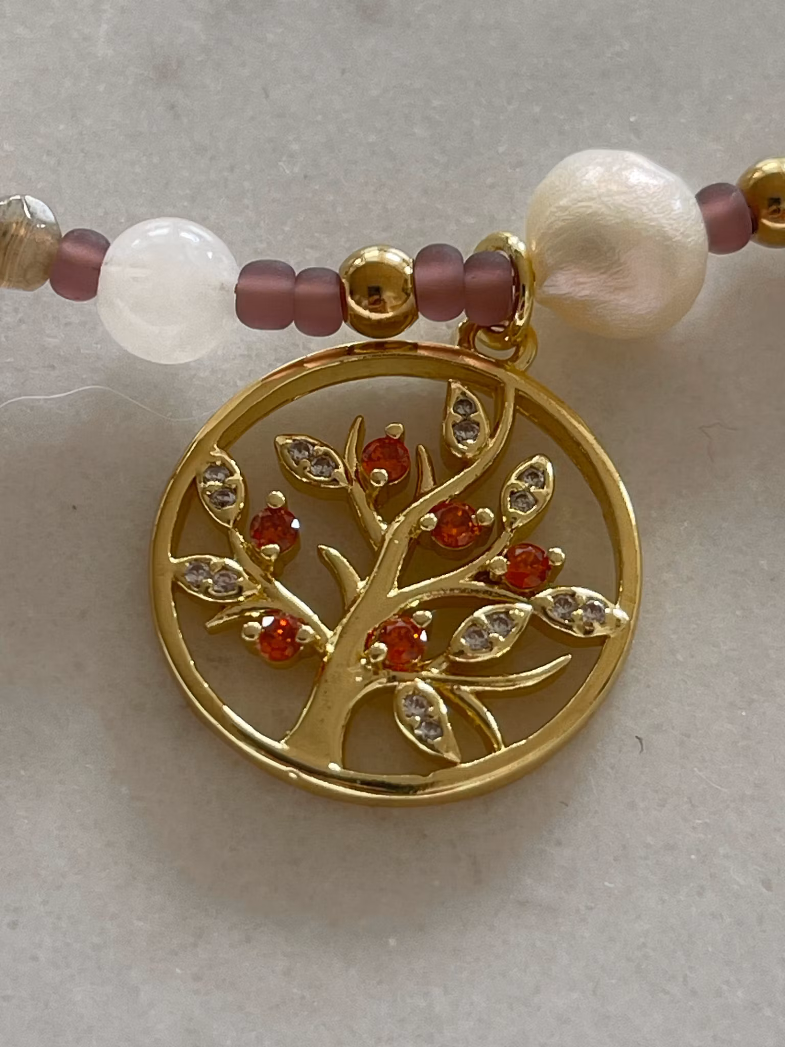 Perlekjede med anheng