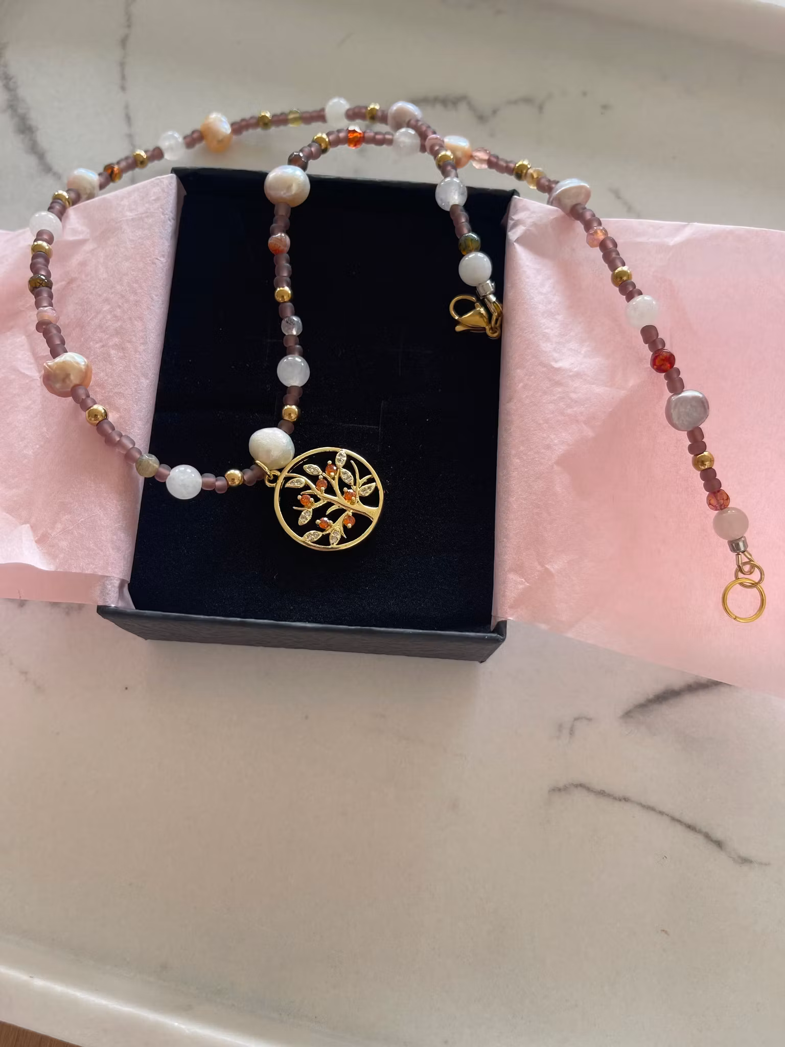 Perlekjede med anheng