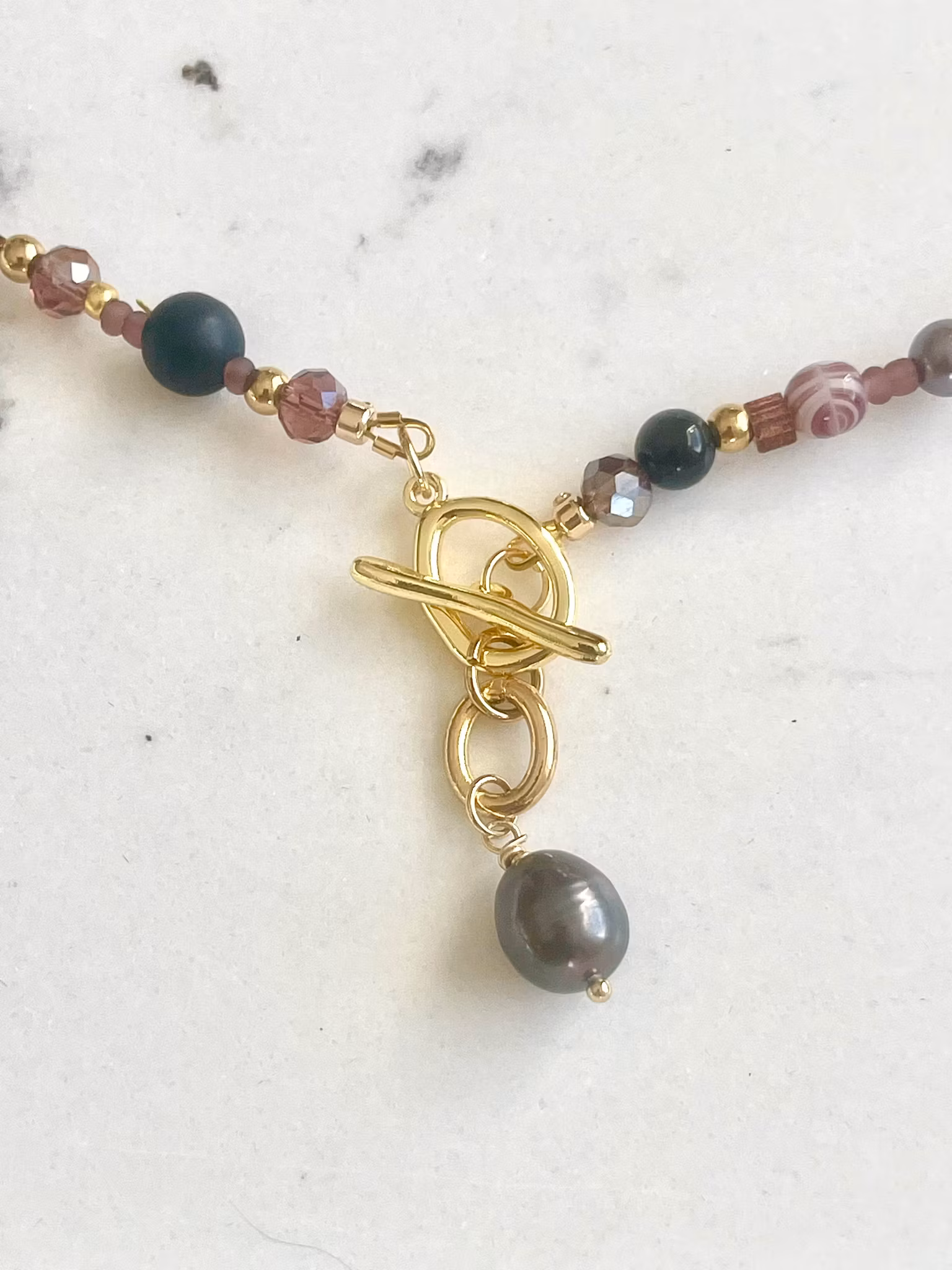 Perlekjede med anheng