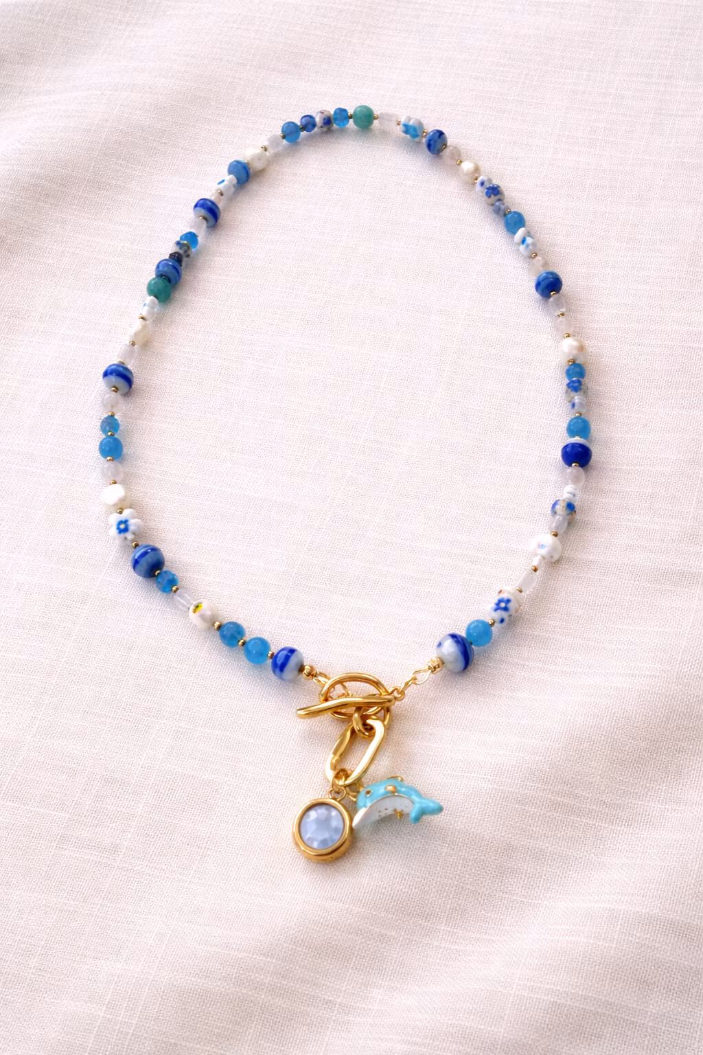 Smykke med anheng 🐬