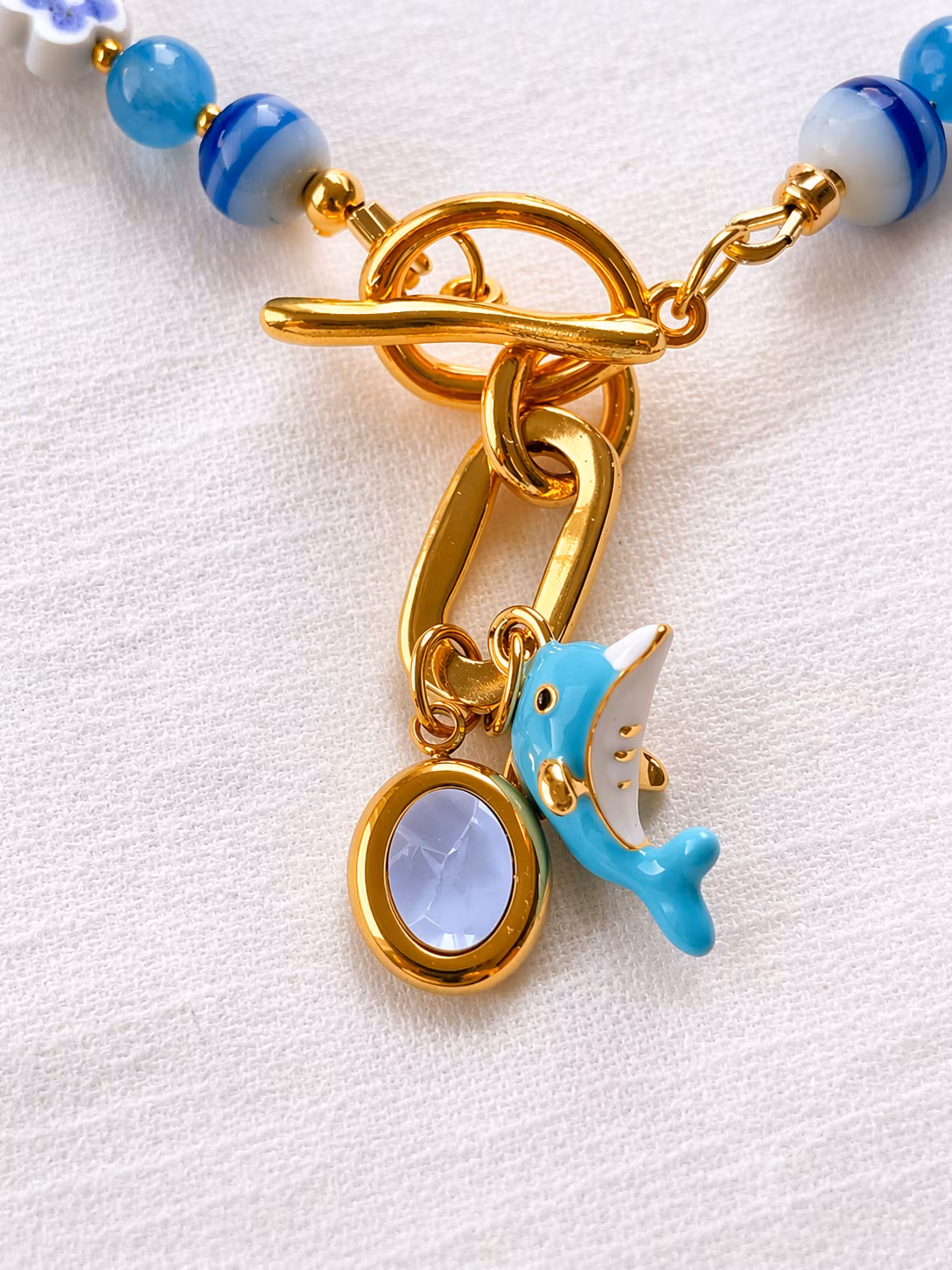 Smykke med anheng 🐬