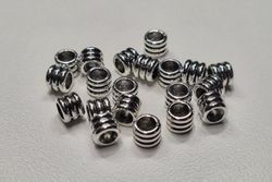 20 silverfärgade spacer beads i metall (6x6 mm)