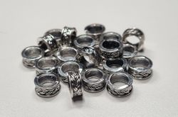 20 silverfärgade spacer beads i metall (9x4 mm)