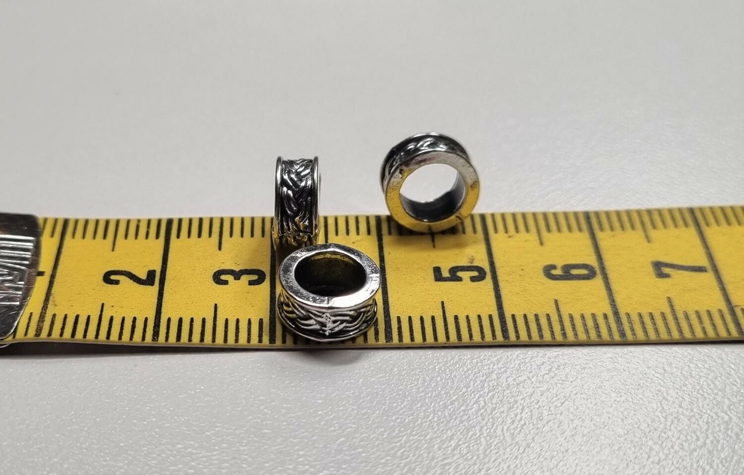 20 silverfärgade spacer beads i metall (9x4 mm)