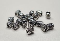20 silverfärgade spacer beads i metall (5x6 mm)