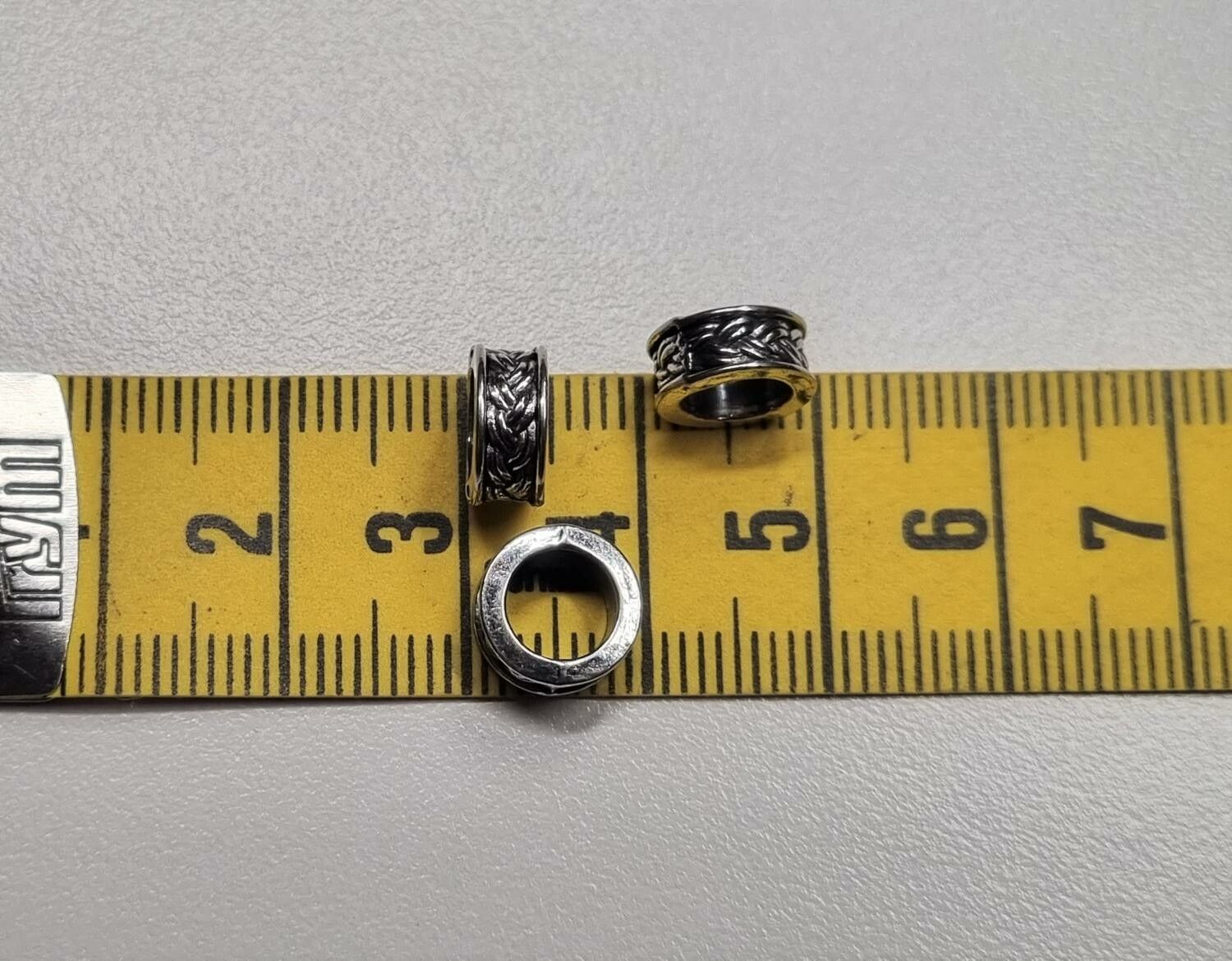 20 silverfärgade spacer beads i metall (9x4 mm)