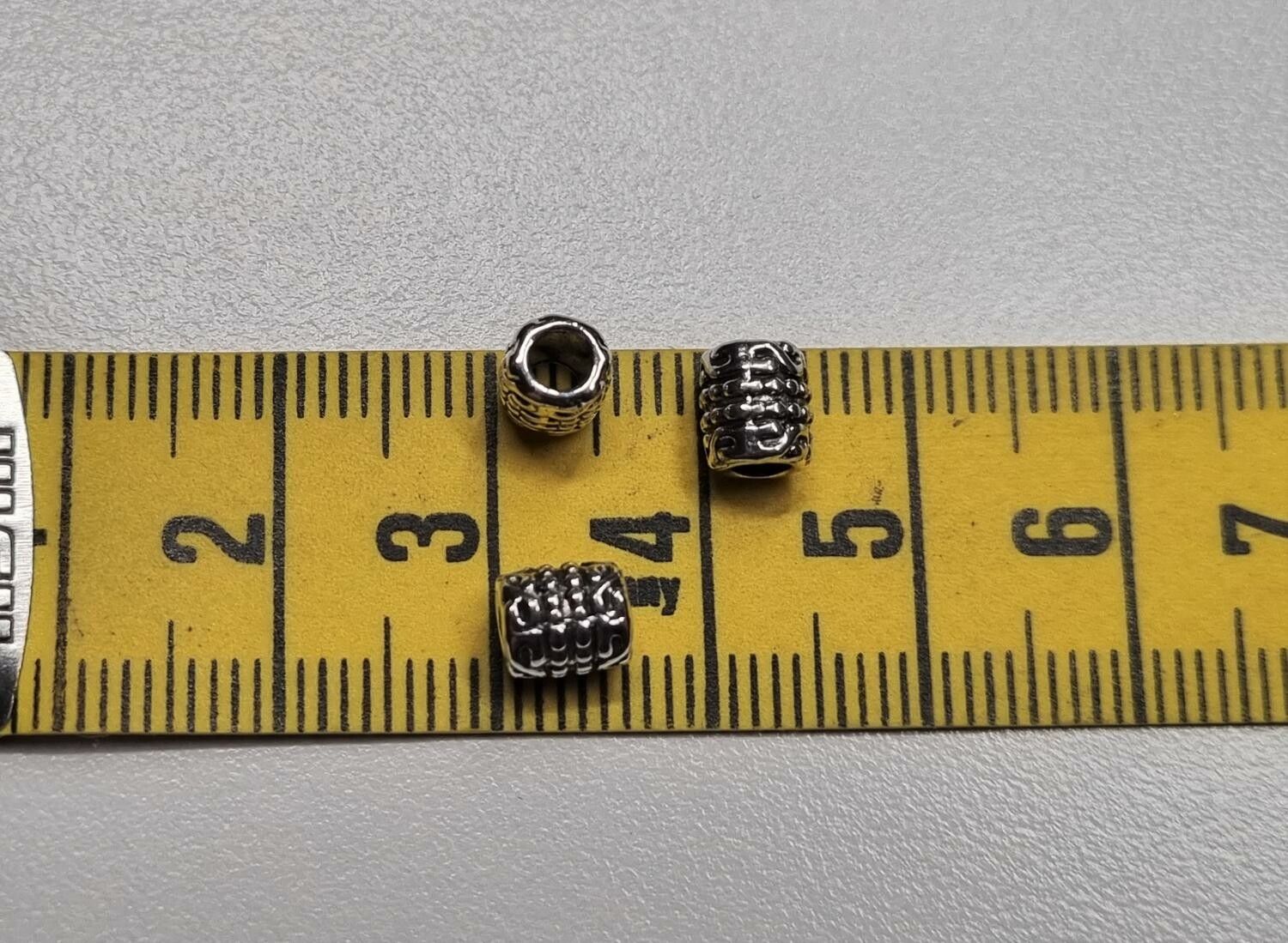20 silverfärgade spacer beads i metall (5x6 mm)