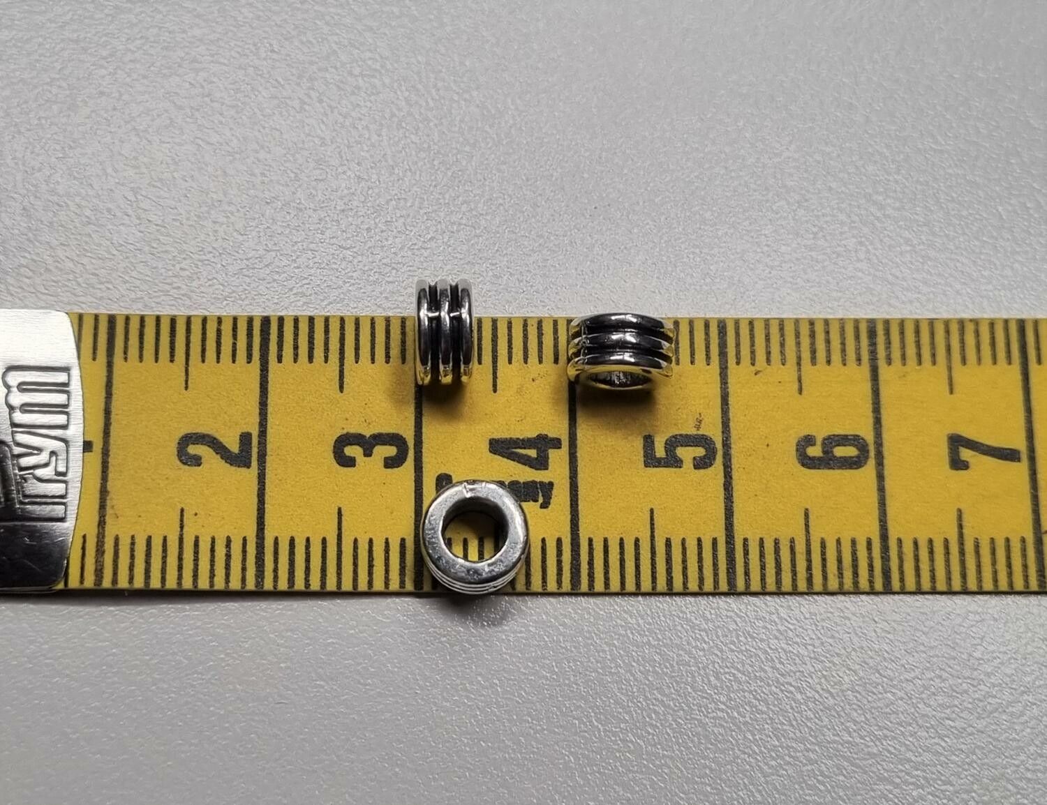 20 silverfärgade spacer beads i metall (6x6 mm)