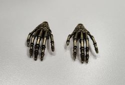 2 st bronsfärgade händer / skeletthänder, hängen / berlocker