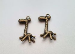 2 st bronsfärgade Giraffer, berlocker, charms