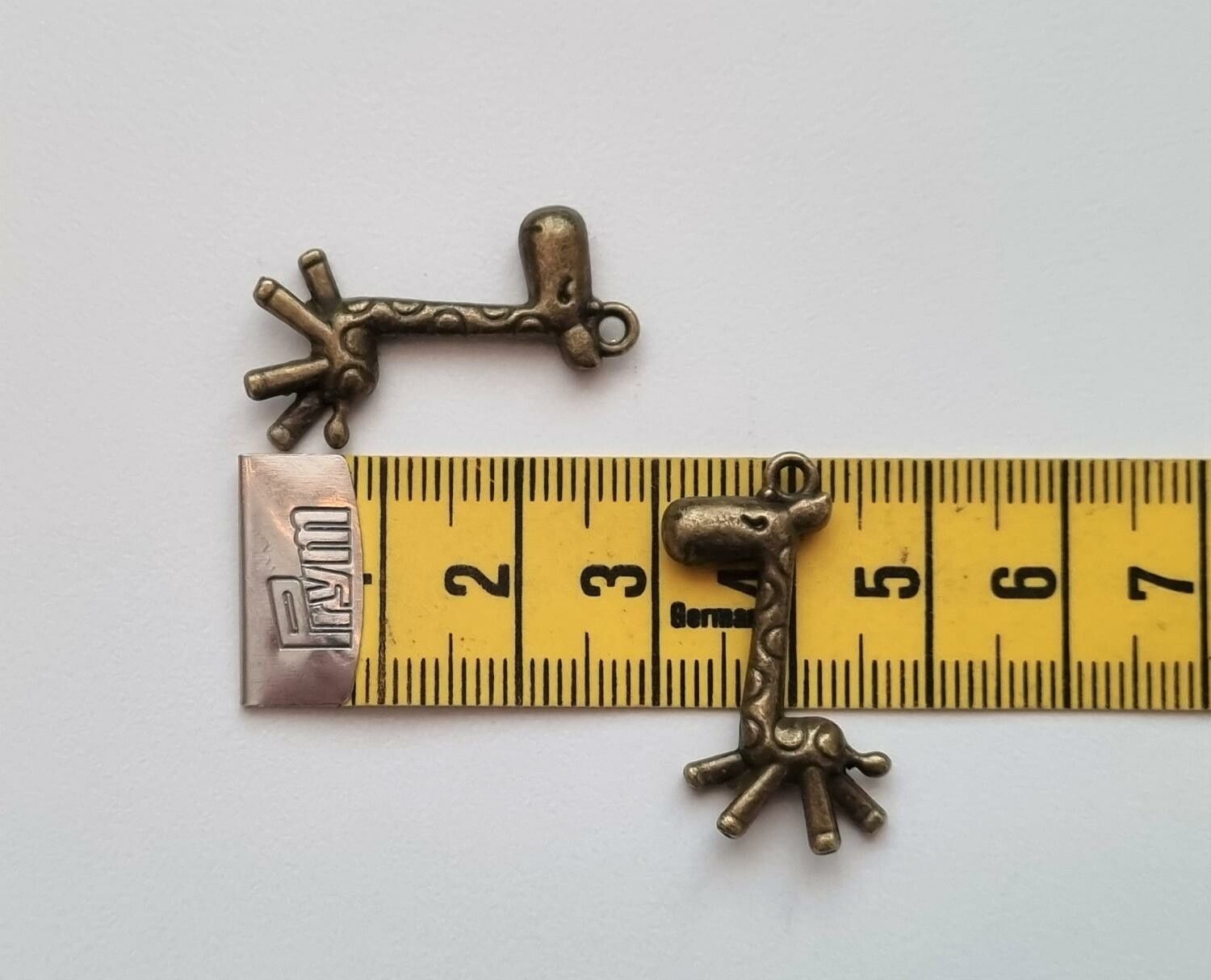 2 st bronsfärgade Giraffer, berlocker, charms