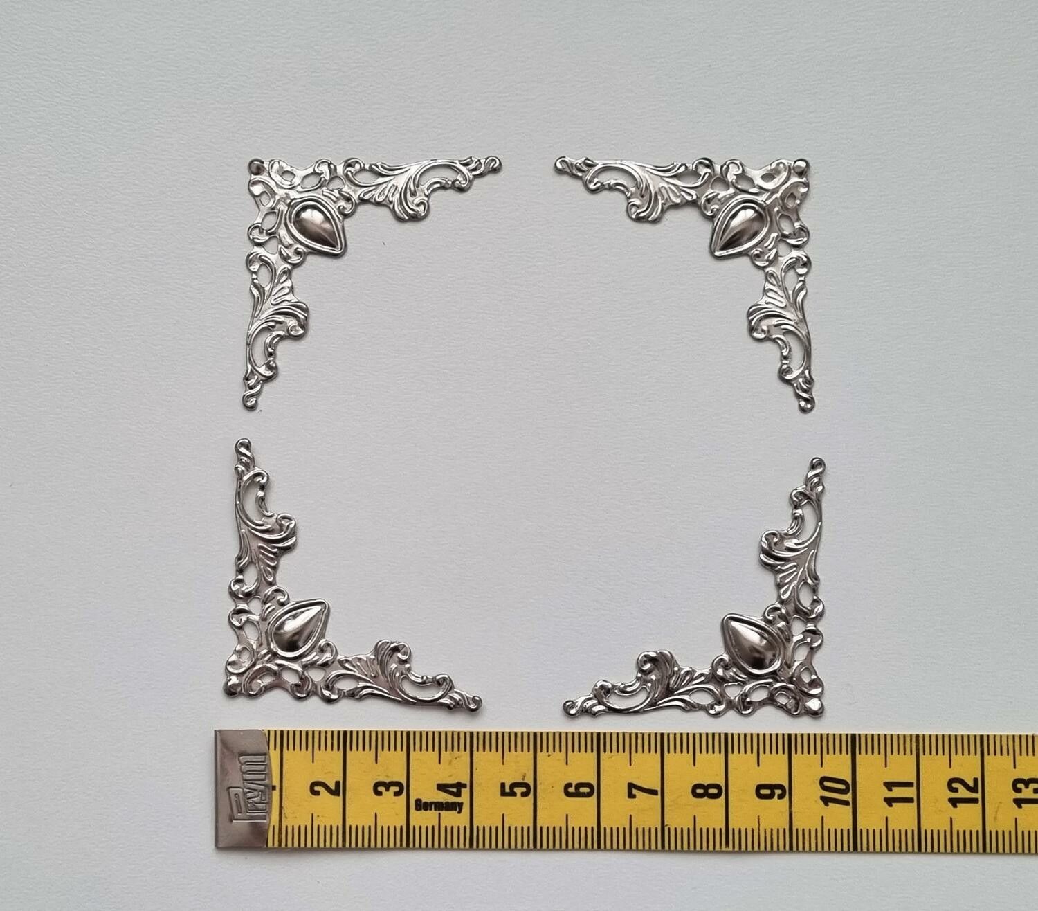 4 ramar, mini ramar, miniatyrramar för scrapbooking (silverfärgade)