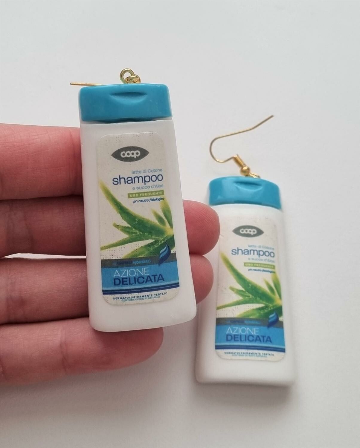Ett par örhängen, Shampoo / duschcreme (32,5 gram)
