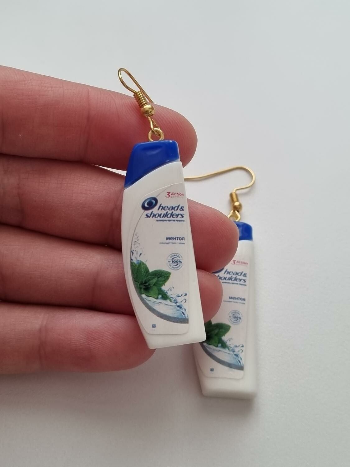 Ett par örhängen, Shampoo / duschcreme (9 gram)