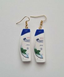 Ett par örhängen, Shampoo / duschcreme (9 gram)