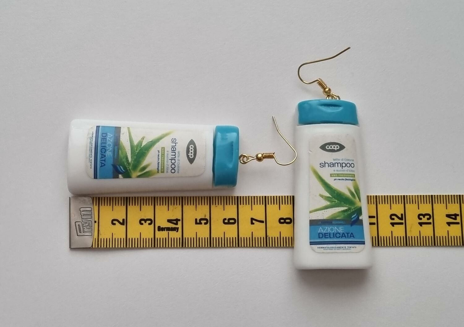 Ett par örhängen, Shampoo / duschcreme (32,5 gram)