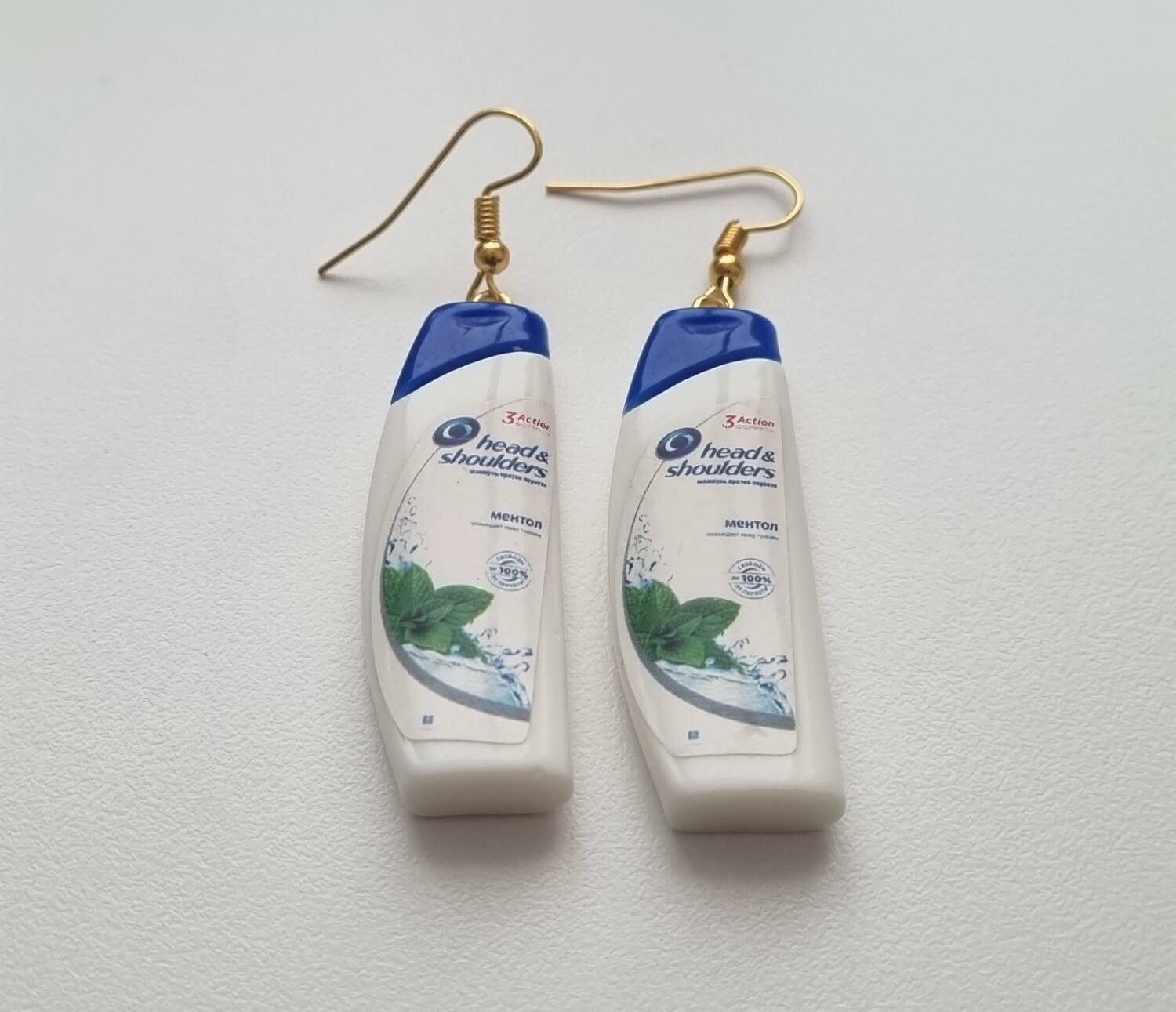 Ett par örhängen, Shampoo / duschcreme (9 gram)