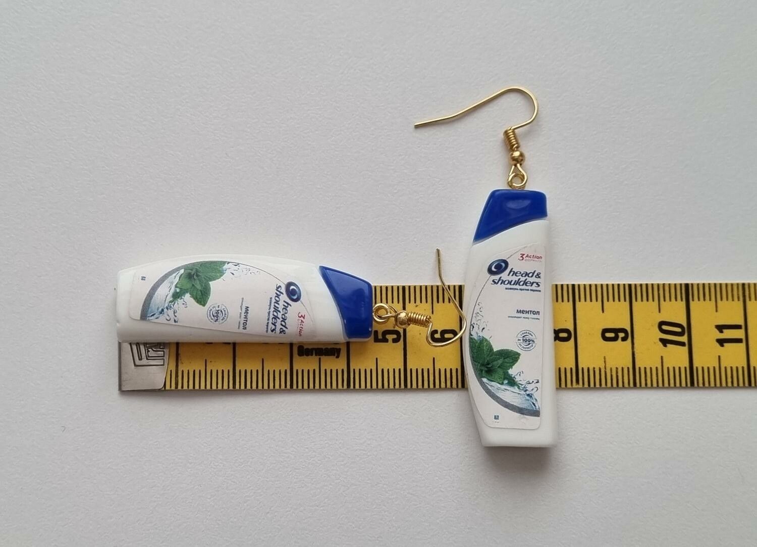 Ett par örhängen, Shampoo / duschcreme (9 gram)