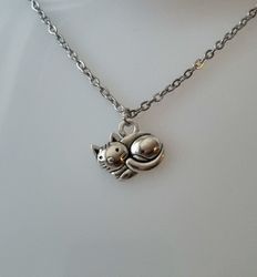 Halsband med en katt, kattberlock / charm